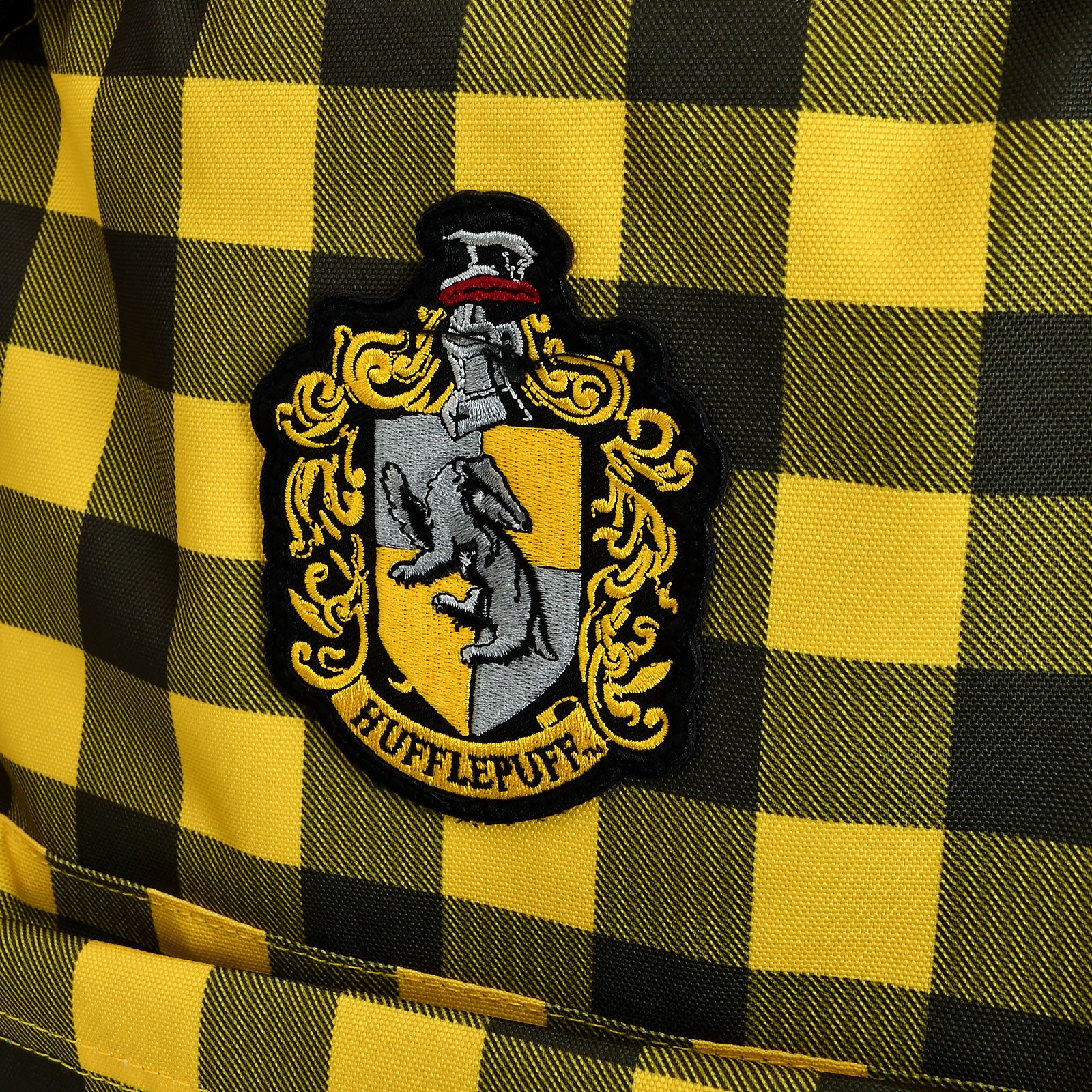 Zdjęcie produktu Harry Potter - Plecak w kratę z herbem Hufflepuff