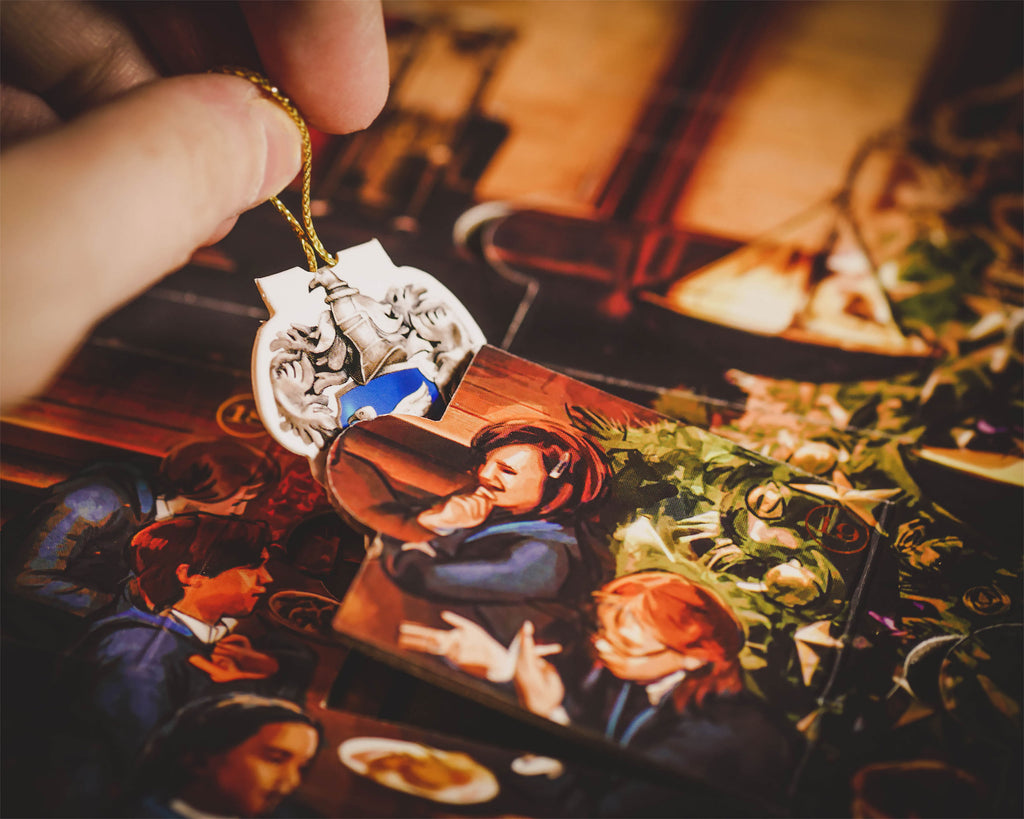 Zdjęcie produktu Harry Potter - Święta w Hogwarcie - Wielka Księga Kalendarza Adwentowego