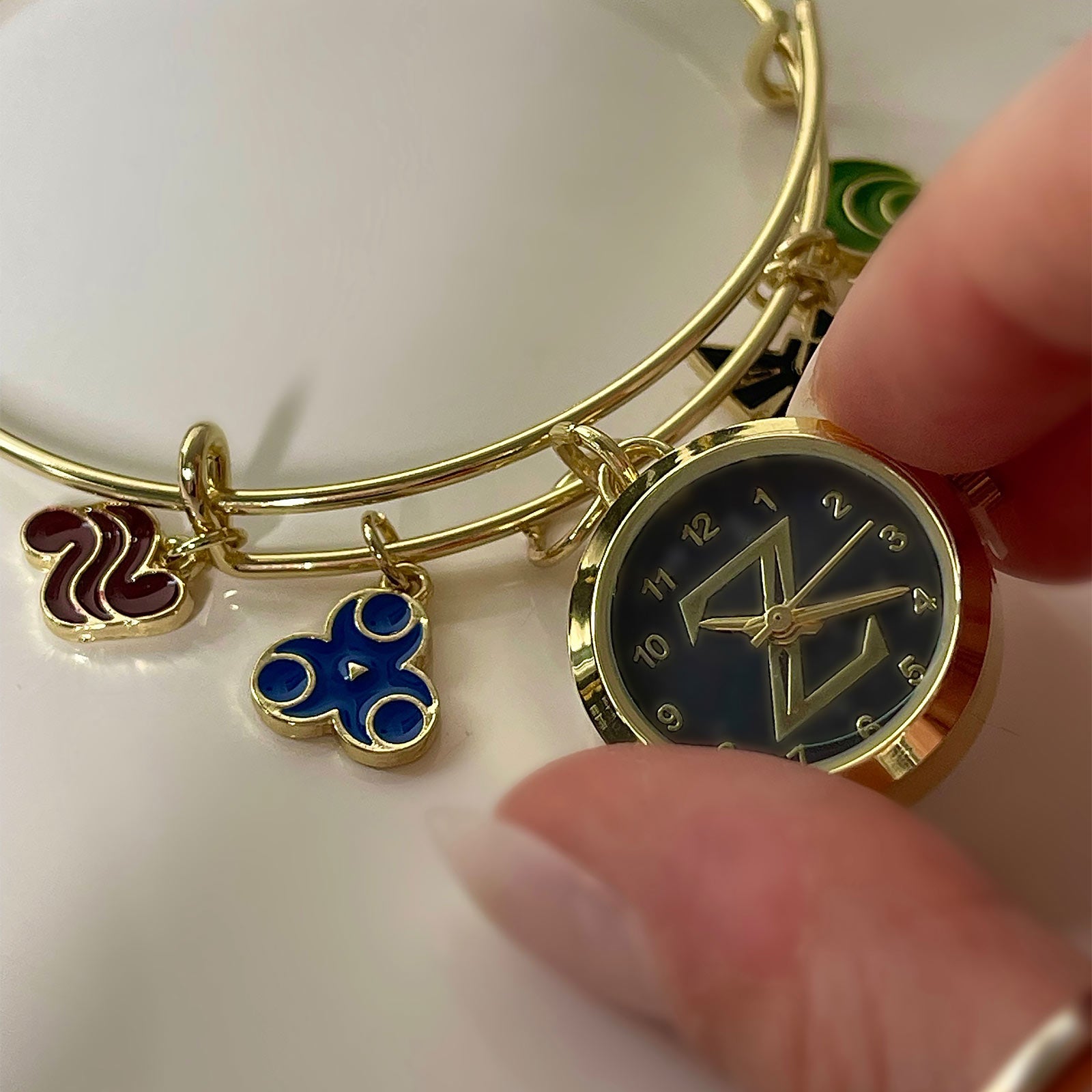 Zdjęcie produktu Zelda - Bransoletka z zawieszkami Symboli i zegarkiem