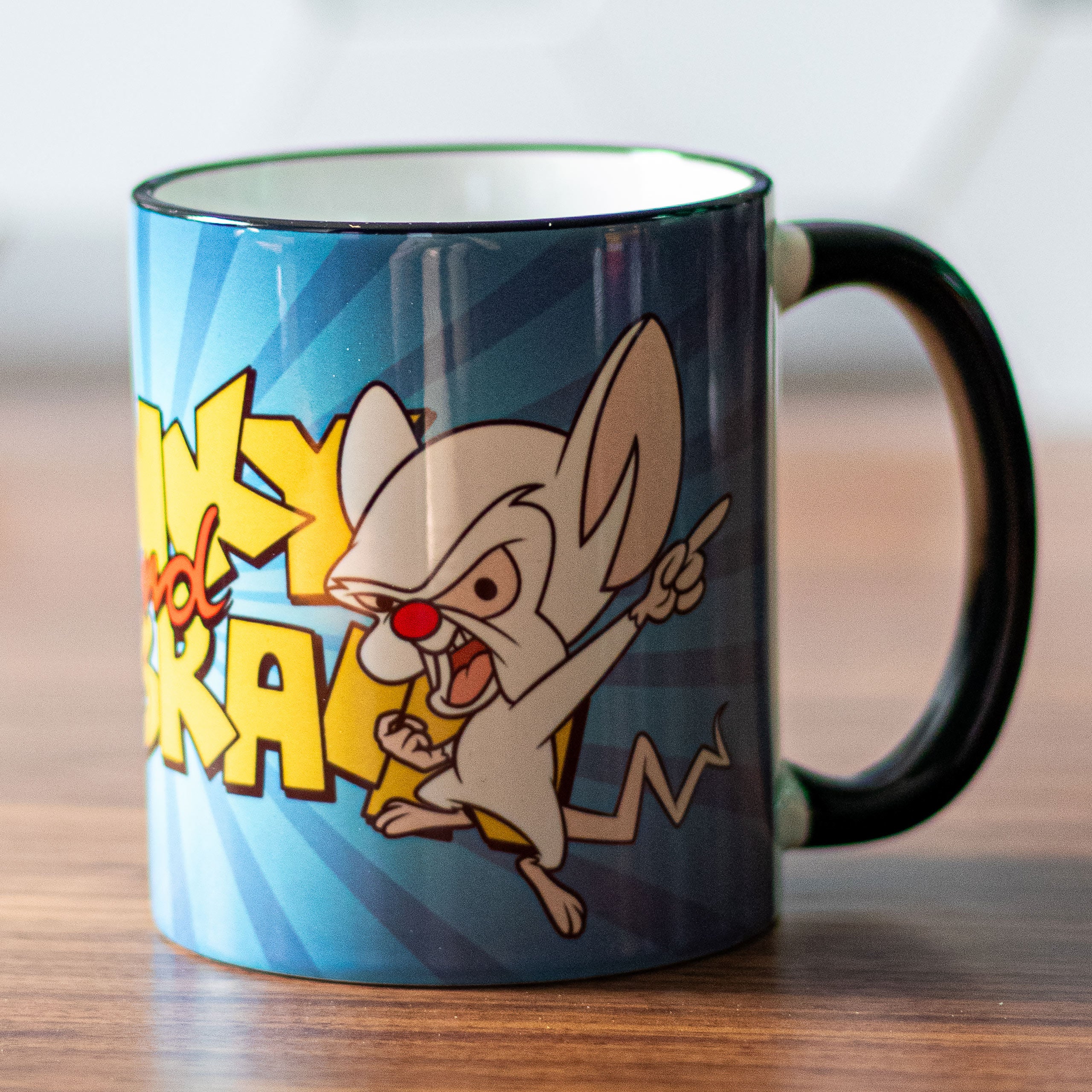 Zdjęcie produktu Pinky i Mózg - Kubek z logo