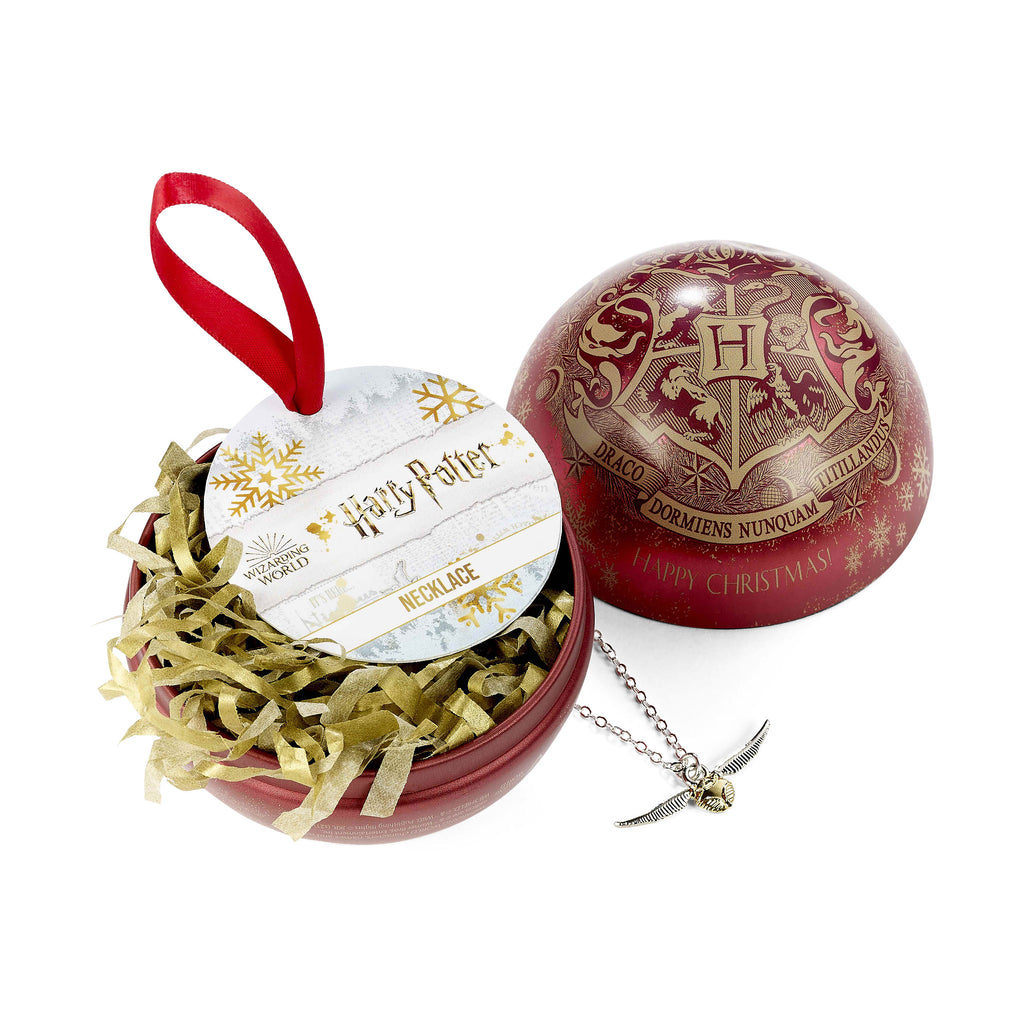 Zdjęcie produktu Harry Potter - Bombka świąteczna z herbem Hogwartu i naszyjnikiem ze Złotym Zniczem