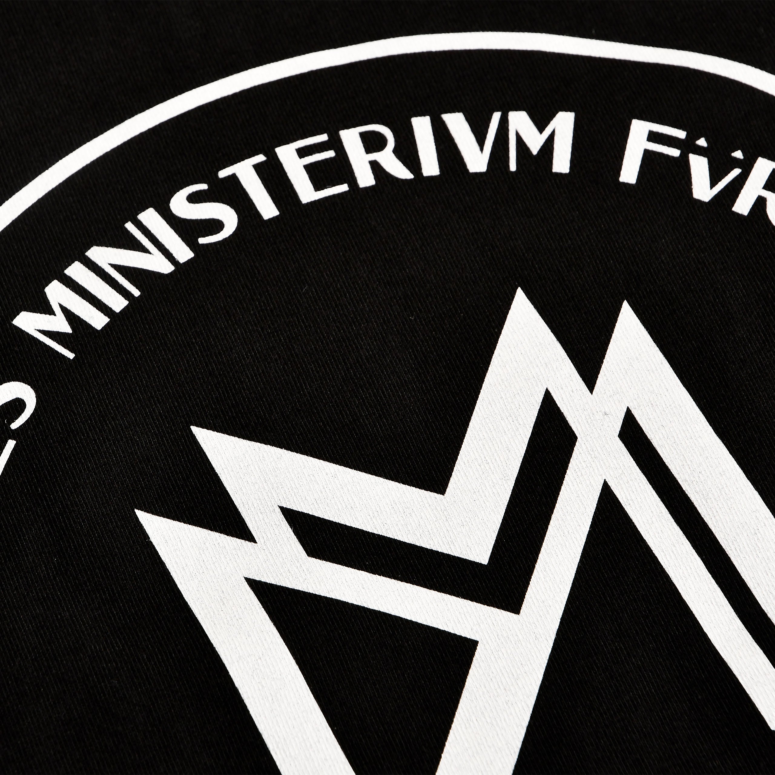 Zdjęcie produktu Czarna koszulka Niemieckie Ministerstwo Magii - Fantastyczne Zwierzęta