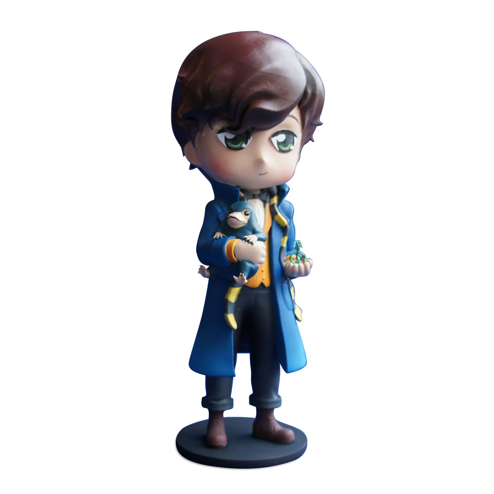 Zdjęcie produktu Figurka Newt Scamander z Niuchaczem - Fantastyczne Zwierzęta
