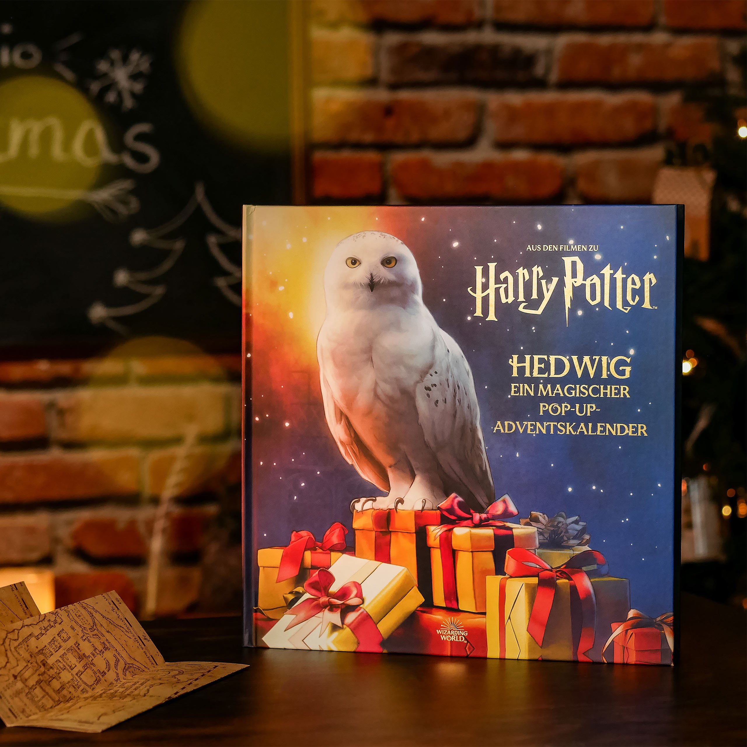 Zdjęcie produktu Harry Potter - Święta z Hedwigą - Wielka książka adwentowa Pop-up