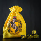 Zdjęcie produktu Harry Potter - Hufflepuff RPG Zestaw Kości 5 szt. z woreczkiem żółty