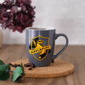 Zdjęcie produktu Kubek z logo Hufflepuff szary - Harry Potter