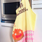 Zdjęcie produktu Ruchomy zamek Hauru – Fartuch Calcifer
