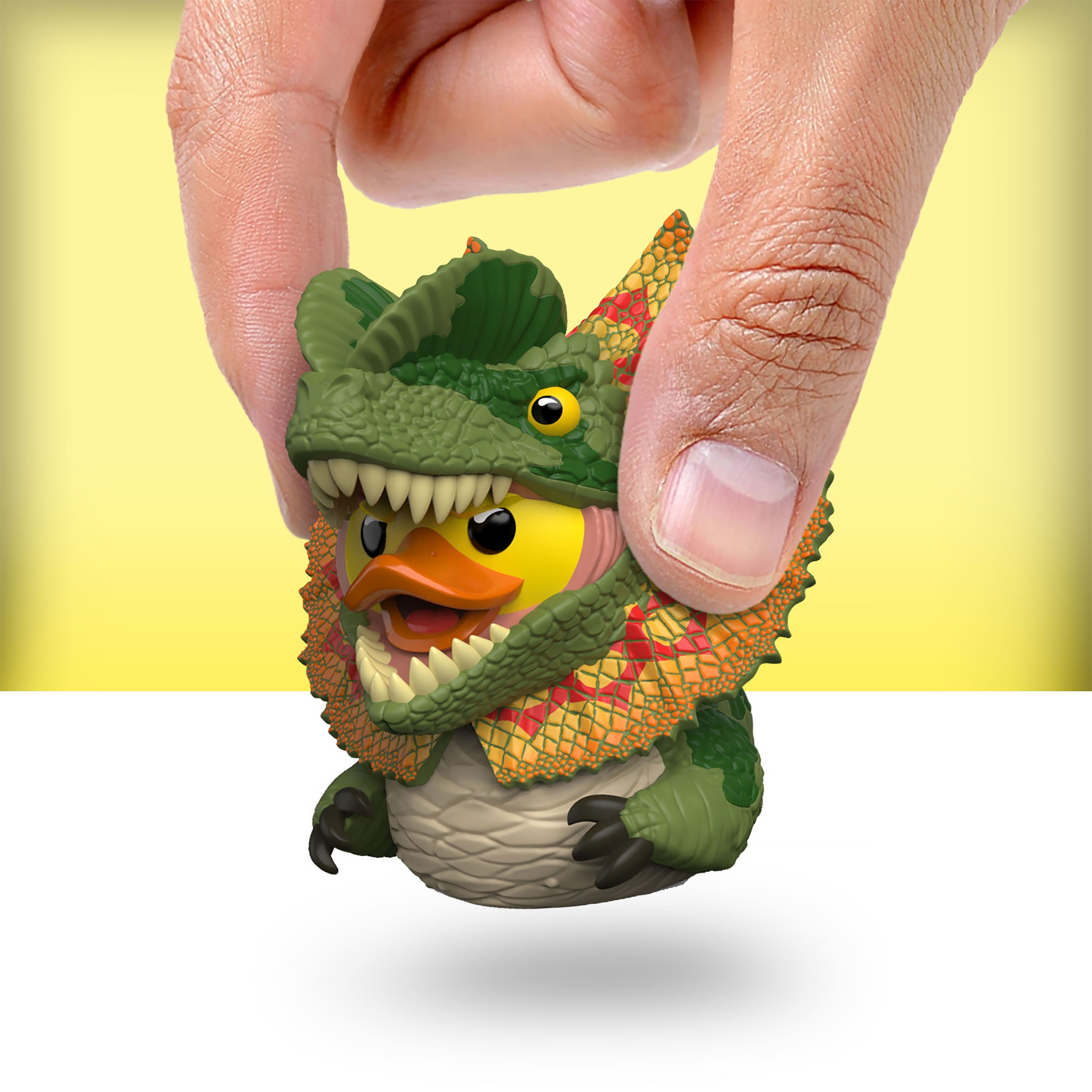 Zdjęcie produktu Jurassic Park - Mini kaczka dekoracyjna Dilophosaurus TUBBZ