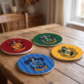 Zdjęcie produktu Harry Potter - Podkładki z herbami domów zestaw 4 szt.