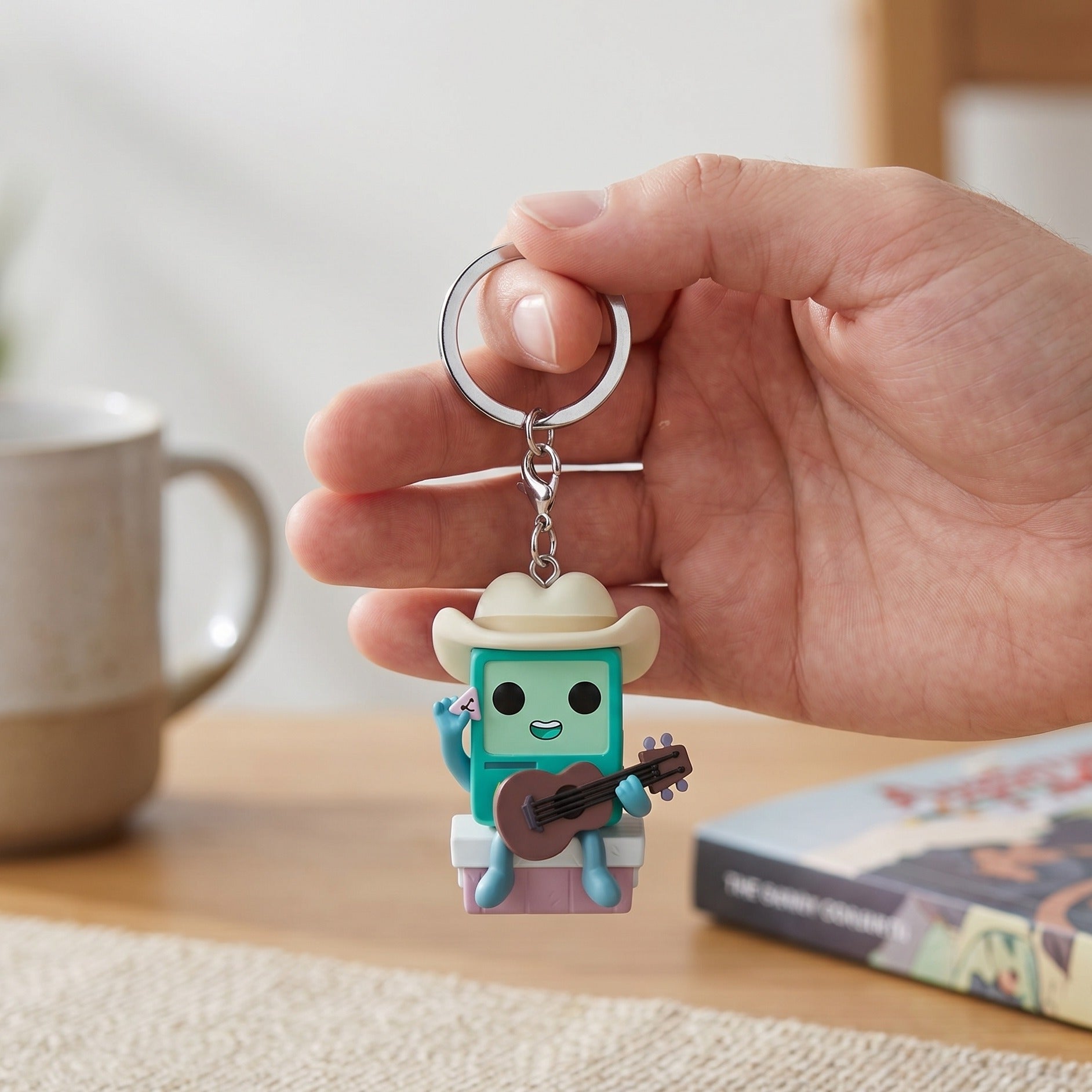 Zdjęcie produktu Adventure Time - Cowboy BMO z gitarą brelok Funko Pop