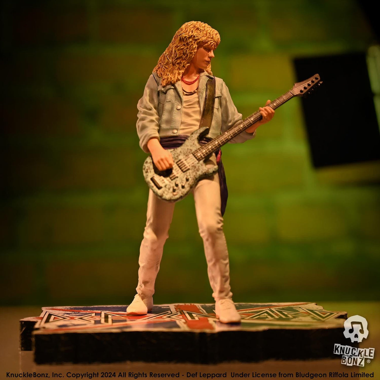 Zdjęcie produktu Def Leppard Rock Iconz Figurka Rick Savage 24 cm