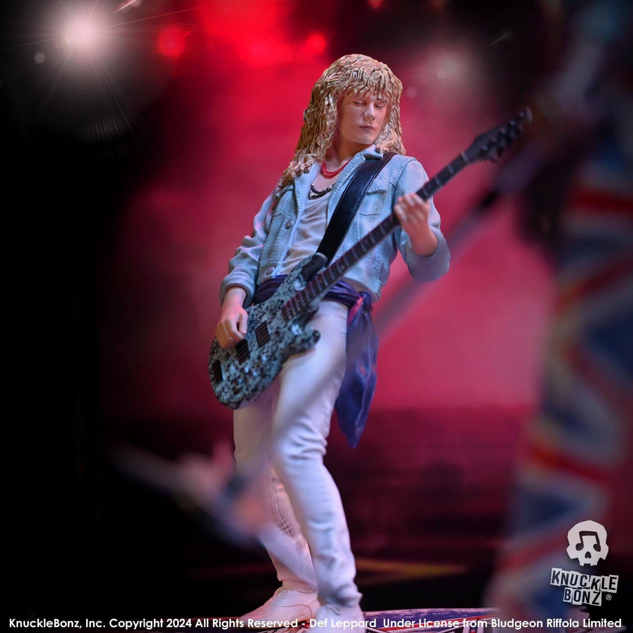 Zdjęcie produktu Def Leppard Rock Iconz Figurka Rick Savage 24 cm