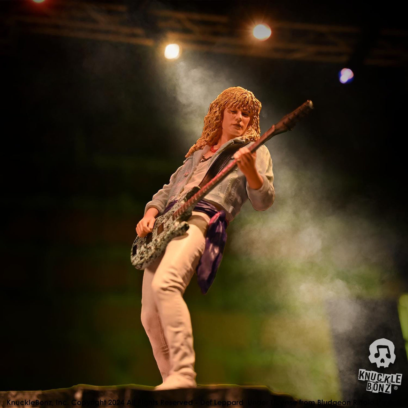 Zdjęcie produktu Def Leppard Rock Iconz Figurka Rick Savage 24 cm