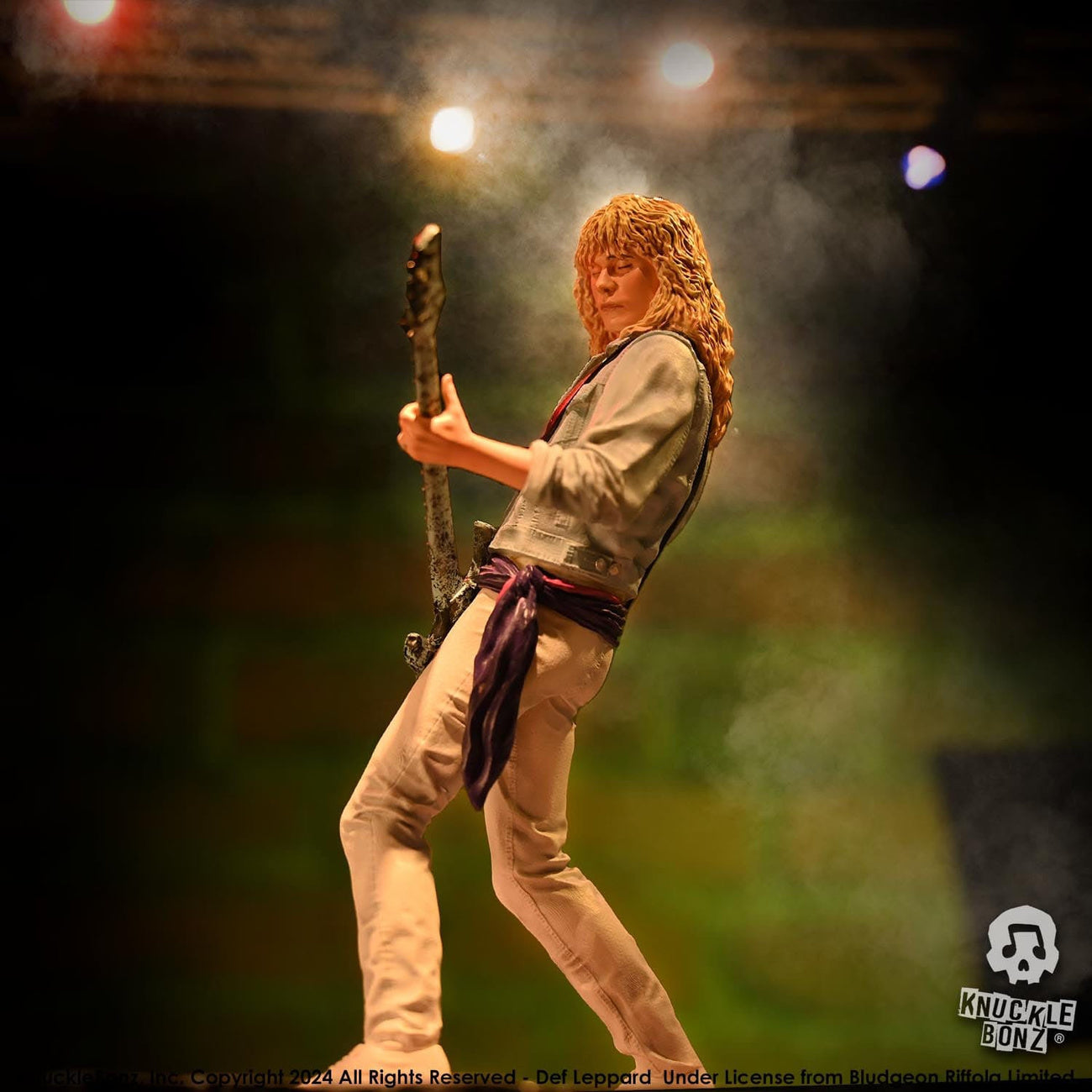 Zdjęcie produktu Def Leppard Rock Iconz Figurka Rick Savage 24 cm
