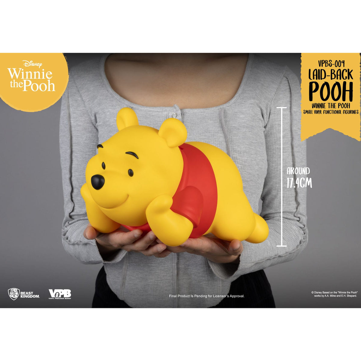 Product image Winnie the Pooh Small Vinyl Money Box Lying Winnie 17 cm